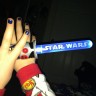 Blue Light Saber and Blue Polished Finger Nails